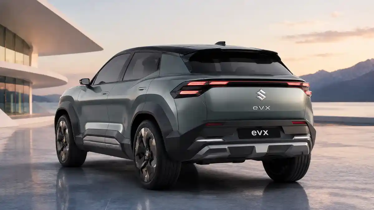 "Rear view of a futuristic Suzuki electric SUV concept with connected LED taillights, modern aerodynamic design, and premium styling, showcasing a next-generation 2027 electric vhicle.